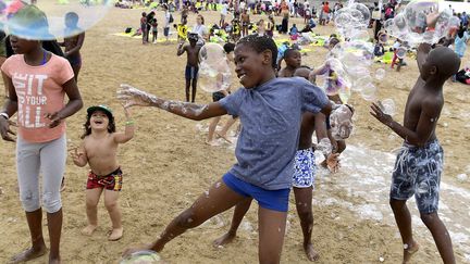 Des enfants de région parisienne à Cabourg (Calvados), dans le cadre de la Journée des oubliés des vacances, le 22 août 2018 (MAXPPP)