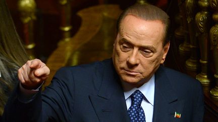 L'ancien chef du gouvernement italien, Silvio Berlusconi, le 2 octobre 2013 au S&eacute;nat, &agrave; Rome (Italie). (FILIPPO MONTEFORTE / AFP)