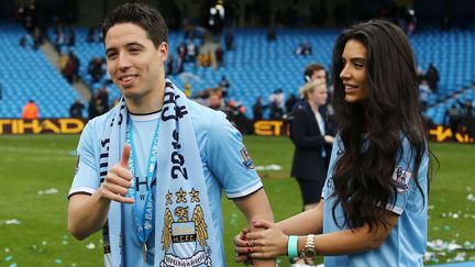 Le footballeur fran&ccedil;ais&nbsp;Samir Nasri et sa compagne anglaise,&nbsp;Anara Atanes, &agrave; Manchester (Royaume-Uni), le 11 mai 2014.&nbsp; (MATT WEST / REX / SIPA)