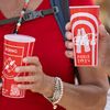 Spectators hold Coca-Cola ecocups during the Paris 2024 Olympics. Illustration. (SEBASTIAN KAHNERT / DPA)