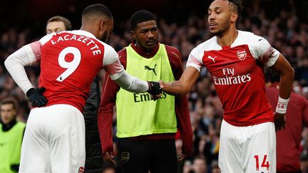 Alexandre Lacazette et Pierre-Emerick Aubameyang (ADRIAN DENNIS / AFP)