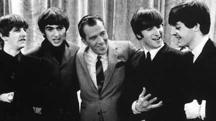 Les Beatles avec Ed Sullivan le 9 février 1964
 (UPI / AFP)