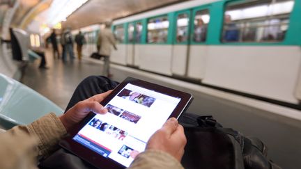 SFR veut d&eacute;ployer la 3G et 4G dans 75% du r&eacute;seau RATP, soit 170 gares, d'ici &agrave; 2014. (FRANCOIS GUILLOT / AFP)