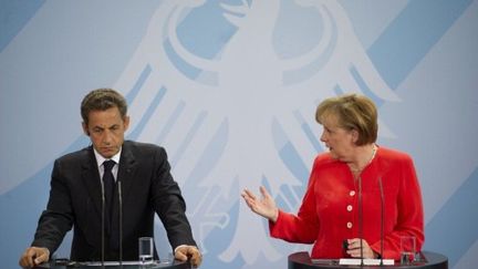 Nicolas Sarkozy et Angela Merkel (17/06/2011) (AFP/ODD ANDERSEN)