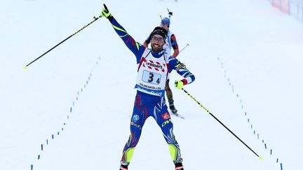 Le Français Martin Fourcade célèbre sa victoire lors du relais mixte lors des Mondiaux&nbsp;de biathlon organisés à Oslo (Norvège), le 3 mars 2016. (HAKON MOSVOLD LARSEN / AP / SIPA)