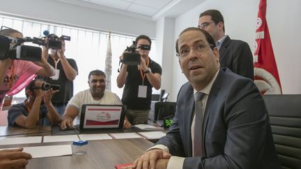 Le Premier ministre tunisien, Youssef Chahed, présente sa candidature aux prochaines élections présidentielles dans les locaux de la commission électorale de Tunis, en Tunisie, le 9 août 2019. (YASSINE GAIDI / ANADOLU AGENCY)