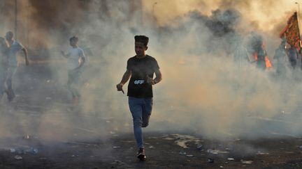 Un manifestant dans les rues de Bagdad, en Irak, le 5 octobre 2019. (AHMAD AL-RUBAYE / AFP)