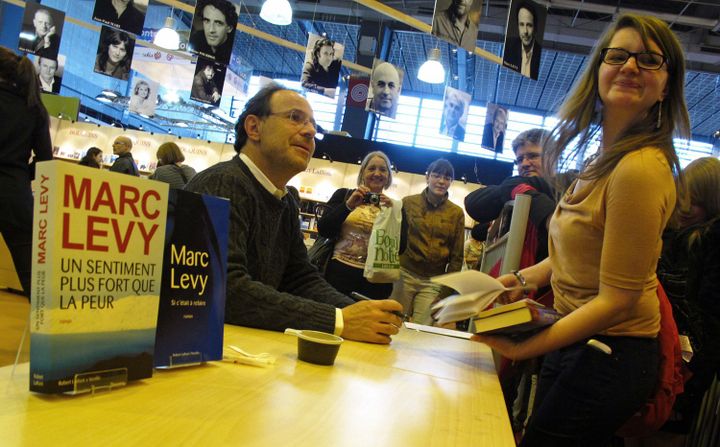 Une fan de Marc Levy heureuse
 (Laurence Houot/Culturebox)