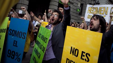 Une manifestation pour l'anniversaire du mouvement des Indign&eacute;s, le 12 mai 2012 &agrave; Madrid (Espagne). (GABRIEL PECOT / CITIZENSIDE / AFP)