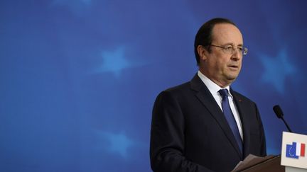 Fran&ccedil;ois Hollande lors d'une conf&eacute;rence de presse &agrave; l'issue d'un Conseil europ&eacute;en, &agrave; Bruxelles (Belgique), le 21 mars 2014. (ALAIN JOCARD / AFP)