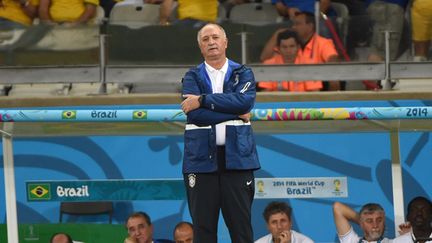 Luiz Felipe Scolari complètement dépité de voir le Brésil humilié par l'Allemagne en demi-finale de son Mondial (PEDRO UGARTE / AFP)