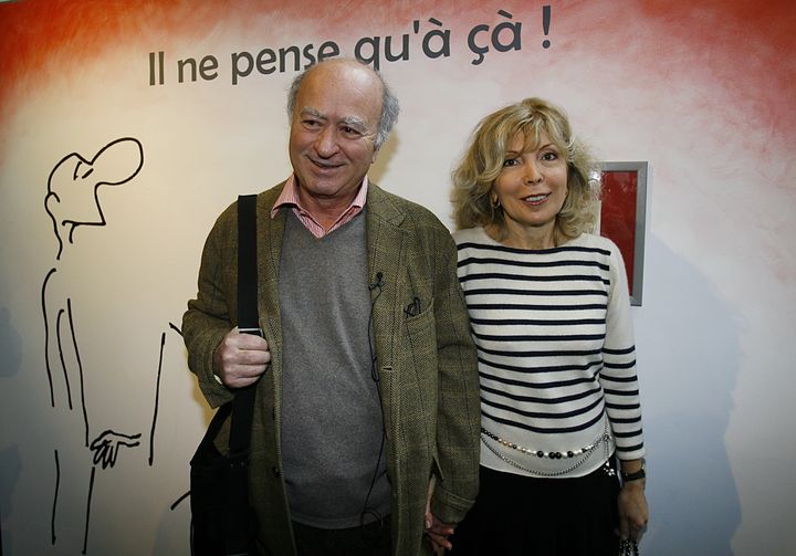 Le dessinateur George Wolinski et son épouse Maryse à Angoulême (Charente), le 26 janvier 2006. (PATRICK BERNARD / AFP)