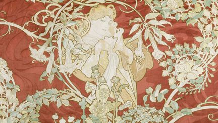 Alphonse Mucha, né en Moravie (dans l'actuelle République tchèque), est connu comme un représentant populaire de l'art nouveau et comme illustrateur, moins pour son ambition de peintre voué à la cause nationale de son pays et des peuples slaves. Le musée du Luxembourg se penche sur ces deux facettes de l'artiste, des affiches pour Sarah Bernhardt aux toiles gigantesques sur l'histoire de son peuple. Du 12 septembre 2018 au 27 janvier 2019. Ici,  Alphonse Mucha, "Femme à la marguerite", velours imprimé 1900, Fondation Mucha, Prague
 (Mucha Trust 2018)