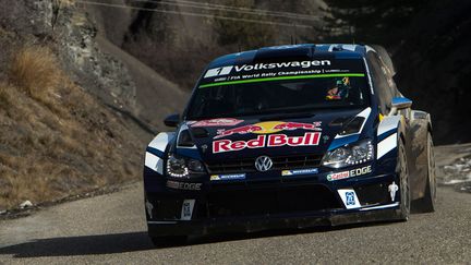 &nbsp; (Sébastien Ogier au volant de sa VOLKSWAGEN POLO WRC sur le rallye de Monte Carlo © MaxPPP)