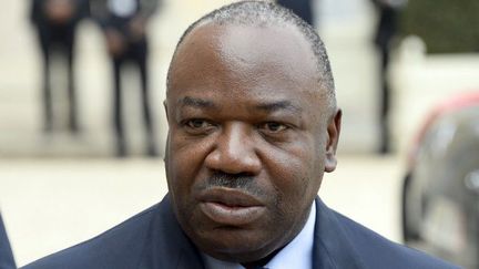 Le président gabonais Ali Bongo s'adresse aux journalistes après un entretien avec son homologue français à l'Elysée, le 8 avril 2014. ( AFP PHOTO / BERTRAND GUAY)