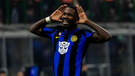 Marcus Thuram célébrant un but sous les couleurs de l'Inter contre Udinese, le 9 décembre 2023. (MAIRO CINQUETTI / AFP)