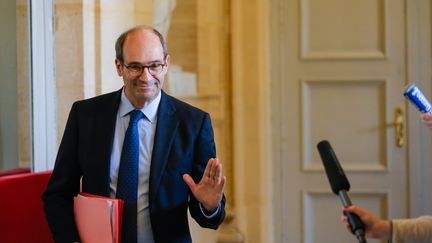 Le d&eacute;put&eacute; (R&eacute;publicains) Eric Woerth quitte l'h&eacute;micycle apr&egrave;s la s&eacute;ance des questions d'actualit&eacute; au gouvernement, &agrave; l'Assembl&eacute;e nationale (Paris), le 1er avril 2015. (JALLAL SEDDIKI / CITIZENSIDE.COM / AFP)