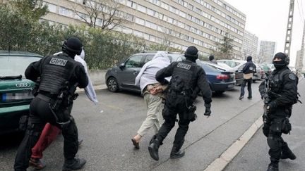 Arrestation d'islamistes présumés mercredi matin (GERARD JULIEN / AFP)