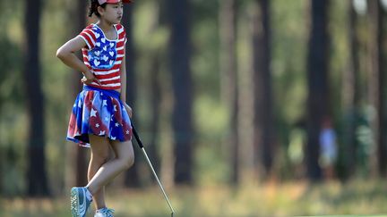 L'Am&eacute;ricaine Lucy Li est &agrave; 11 ans la plus jeune participante &agrave; l'US open f&eacute;minin de golf, Pinehurst (Caroline du Nord, Etats-Unis), le 19 juin 2014. (DAVID CANNON / GETTY IMAGES / AFP)