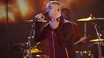 Le rappeur Julien Marie alias Jul lors des 32es Victoires de la Musique, en février 2017 au Zenith à Paris. (THOMAS SAMSON / AFP)