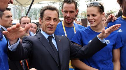 &lt;p&gt;Laure Manaudou aura embrass&amp;eacute; du beau monde pendant sa carri&amp;egrave;re. Elle est l'une des ambassadrices de la candidature de Paris aux Jeux de 2012, ce qui lui vaut d'&amp;ecirc;tre invit&amp;eacute;e &amp;agrave; l'Elys&amp;eacute;e par Jacques Chirac. Elle a aussi rencontr&amp;eacute; Nicolas Sarkozy, ici au village olympique des JO de P&amp;eacute;kin, en 2008.&lt;/p&gt; (GETTY IMAGES )