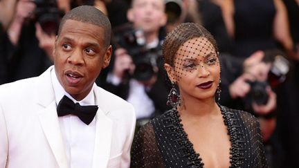 Jay Z et Béyoncé en mai 2014.
 (Neilson Barnard / GETTY IMAGES NORTH AMERICA / AFP)