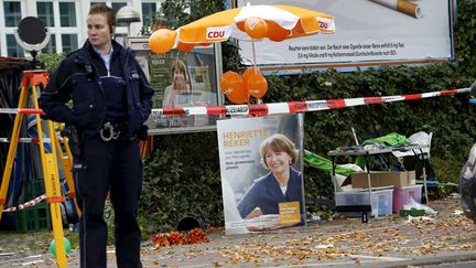 &nbsp; (La police surveille le lieu de l'agression d'Henriette Reker à Cologne © REUTERS/Wolfgang Rattay)