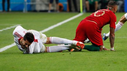 L'Iranien&nbsp;Saeid Ezatolahi face au Portugal le 25 juin 2018 à&nbsp;Saransk&nbsp;(Russie). (JACK GUEZ / AFP)