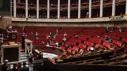 L'Assembl&eacute;e a adopt&eacute; la mesure phare de la loi sur la prostitution, qui punit les clients de 1 500 euros d'amende, dans la nuit du 29 au 30 novembre 2013. (FRANCOIS GUILLOT / AFP)