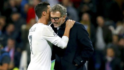 Cristiano Ronaldo et Laurent Blanc. (JUANJO MARTIN / EFE)