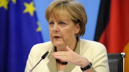 Angela Merkel est confrontée à ses électeurs qui sont majoritairement opposés au plan d'aide des pays de la zone euro. (AFP - John Thys)