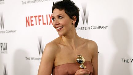 L'actrice am&eacute;ricaine Maggie Gyllenhall, &agrave; la c&eacute;r&eacute;monie des Golden Globes, &agrave; Los Angeles (Etats-Unis), le 11 janvier 2015.&nbsp; (PATRICK FALLON / REUTERS)