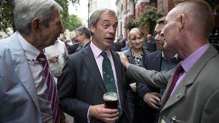 Nigel Fragae (C) le leader de Ukip (United Kingdom Independance Party), le 21 septembre 2013 &agrave; Londres. (NEIL HALL / REUTERS )