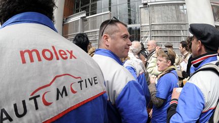  (Des Molex devant le tribunal de grande instance de Toulouse, en 2010 © MAXPPP / La Dépêche du midi / Xavier de Fenoyl)