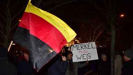 Des manifestants réclament le départ d'Angela Merkel