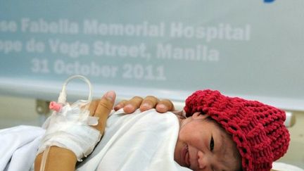 Danica May Camacho, 7 milliardième être humain, est née aux Philippines. (TED ALJIBE / AFP)