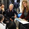 Elisabeth Borne rencontre des enfants dans un centre social à Chanteloup-les-Vignes (Yvelines), le 27 octobre 2023. (BERTRAND GUAY / AFP)