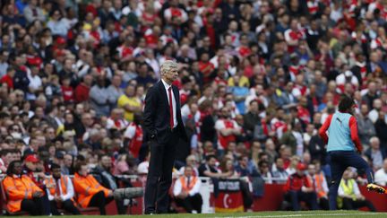 Arsène Wenger vit-il sa dernière saison à l'Emirates Stadium ? (IAN KINGTON / AFP)