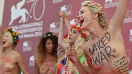 Femen à la Mostra de Venise,  venues défendre "l'Ukraine n'est pas un bordel", un film qui leur rend hommage.
 (GABRIEL BOUYS / AFP)