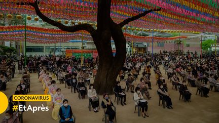 Cérémonie dans un temple bouddhiste de Séoul (Corée du Sud), le 30 avril 2020. (ED JONES / AFP)