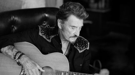 Johnny Hallyday dans le livret de l'album "Mon pays c'est l'amour". (MATHIEU CESAR)