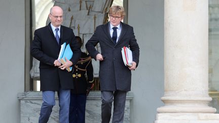 Le ministre de l'Éducation Jean-Michel Blanquer (à gauche) et le ministre délégué aux relations avec le Parlement Marc Fesneau&nbsp;à&nbsp;l'Elysée, le 20 mars 2019. Photo d'illustration. (LUDOVIC MARIN / AFP)