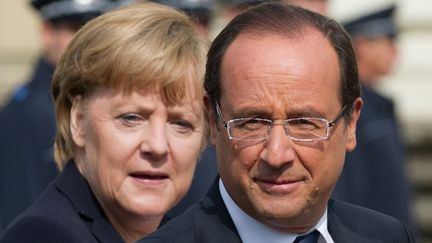 La chanceli&egrave;re allemande, Angela Merkel et le pr&eacute;sident fran&ccedil;ais, Fran&ccedil;ois Hollande, se sont retrouv&eacute;s &agrave; Ludwigsburg (Allemagne), &agrave; l'occasion des 50 ans de l'amiti&eacute; franco-allemande, samedi 22 septembre.&nbsp; (MARIJAN MURAT / DPA / AFP)