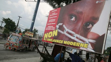 Affiche contre l'esclavage moderne à Port-au-Prince (Haiti).
 (MAXPPP)