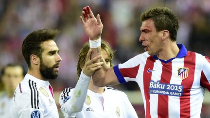 Dani Carvajal et Mario Mandzukic se sont livrés un duel de tous les instants (GERARD JULIEN / AFP)