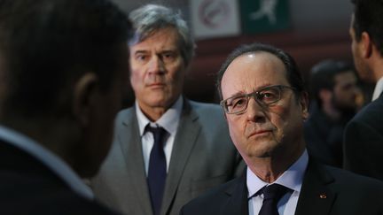 François Hollande et Stéphane Le Foll, ministre de l'Agriculture, lors du salon de l'agriculture, à Paris, le 27 février 2016. (BENOIT TESSIER / AFP)