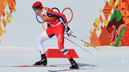 Les Norvégiens dont Magnus Hovdal Moan, champions olympiques du combiné nordique par équipes (ALBERTO PIZZOLI / AFP)