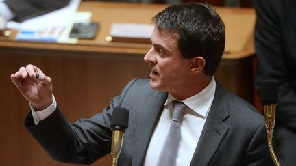 Le ministre de l'Int&eacute;rieur, Manuel Valls, pendant une session de questions au gouvernement, &agrave; l'Assembl&eacute;e nationale, le 12 novembre 2013. (BERTRAND GUAY / AFP)