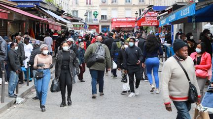 People walk in the Château-Rouge district, in May 2020. Illustrative photo.  (LUDOVIC MARIN / AFP)