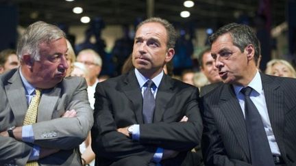 Le président du Sénat Gérard Larcher, le secrétaire général de l'UMP Jean-François Copé et le Premier ministre François Fillon au Campus des Jeunes Populaires, le 4 septembre 2011 à Marseille. (LIONEL BONAVENTURE / AFP)